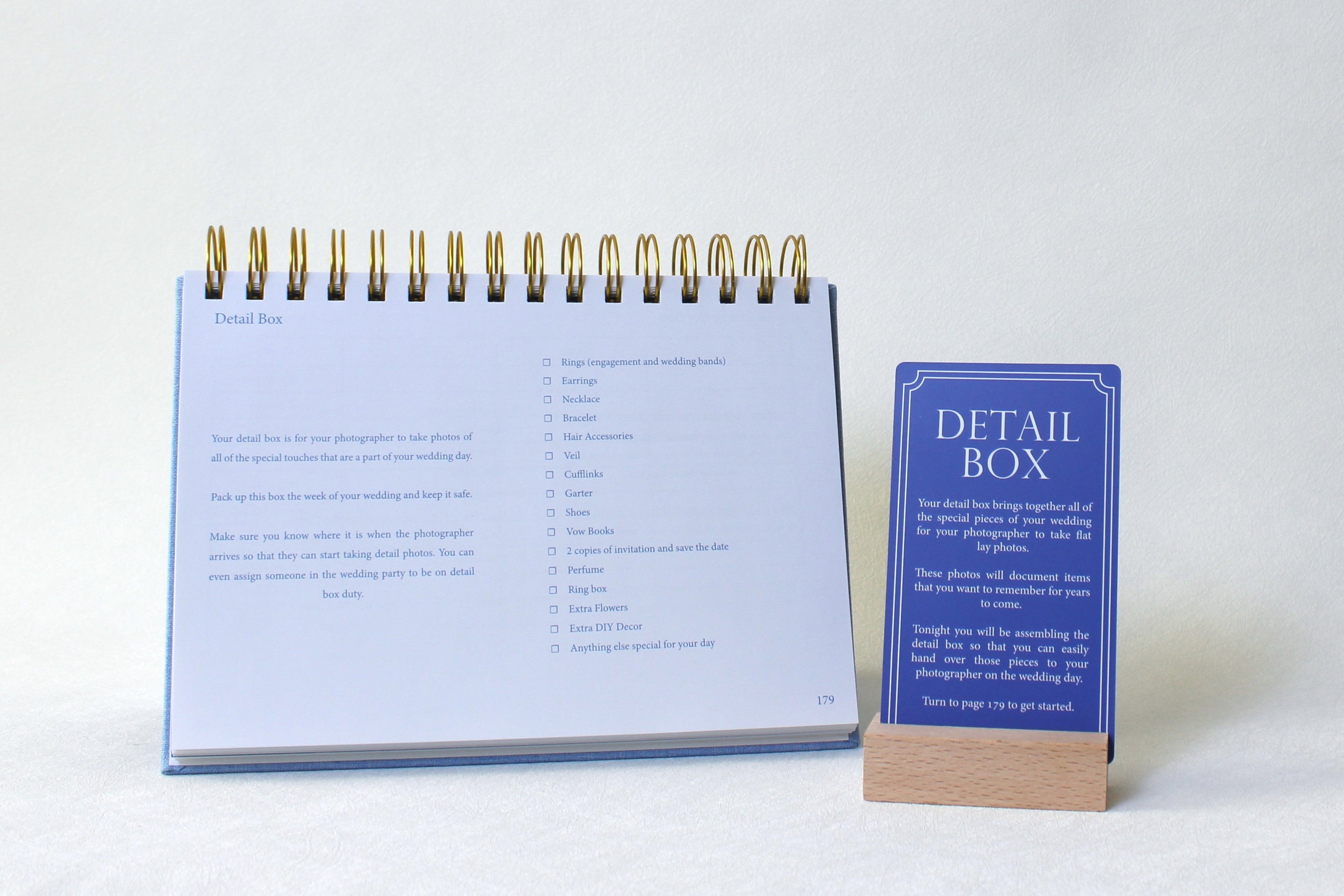 The "Detail Box" page of the wedding planner and the corresponding date night card